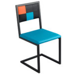 chaise de repas design acier noir et dossier en damier orange turquoise par Les Pieds Sur la Table